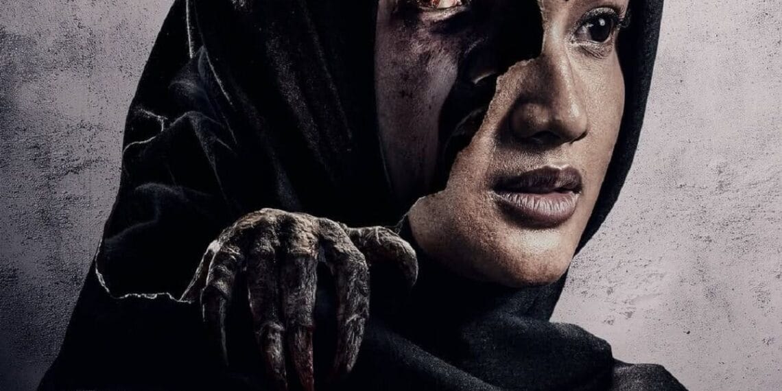 Misteri Tragis Film Maryam: Teror Jin yang Terikat Janji dan Jiwa Poster resmi Maryam: Janji & Jiwa yang Terikat menampilkan sosok Maryam berhijab dengan wajah yang tampak terkoyak, tatapan mata merah menyala, dan tangan misterius di belakangnya—mencerminkan nuansa horor dan ikatan gaib dalam film ini. (Sumber: VMS Studio)