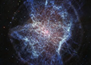 Citra warna-warni NGC 6072 yang diambil oleh James Webb Space Telescope menunjukkan struktur nebulanya yang tidak simetris, seperti cipratan cat—akibat interaksi dua bintang di pusatnya.