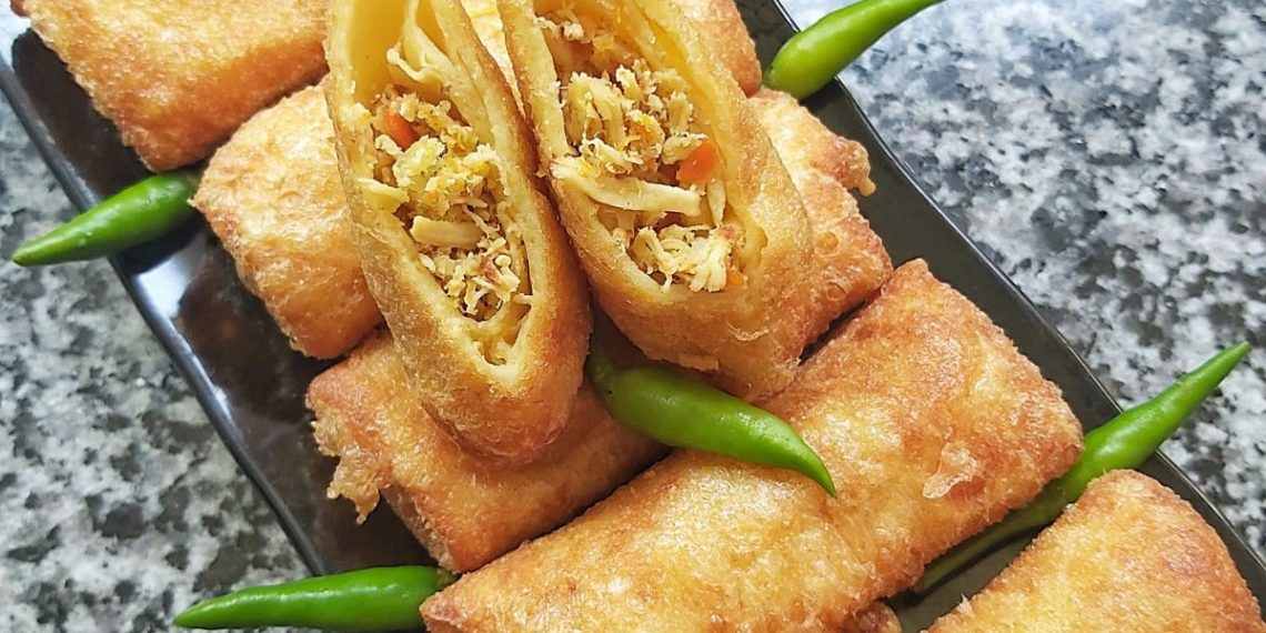 Resep Sosis Solo Isi Ayam Suwir, camilan gurih dan lezat. Praktis dibuat di rumah, cocok untuk teman santai atau ide jualan. (Foto: Cookpad / @ikeoctamila)