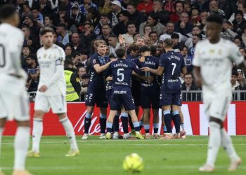 Real Madrid kalah 0-2 dari Celta Vigo setelah dua pemainnya mendapat kartu merah. Simak kronologi lengkap laga pekan ke-15 Liga Spanyol. (Foto: Thomas COEX / AFP)