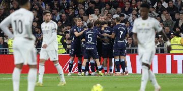 Real Madrid kalah 0-2 dari Celta Vigo setelah dua pemainnya mendapat kartu merah. Simak kronologi lengkap laga pekan ke-15 Liga Spanyol. (Foto: Thomas COEX / AFP)