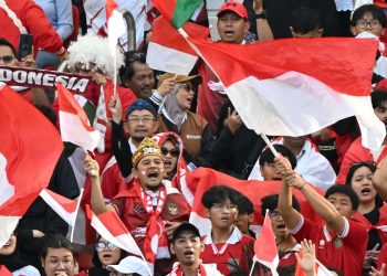 Indonesia dan Vietnam jadi korban salah penempatan bendera di SEA Games 2025 Thailand. Insiden ini memicu kritik tajam dari media dan federasi olahraga. (Foto: AFP/HECTOR RETAMAL)