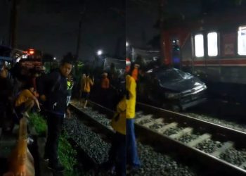Mobil Innova tertemper KRL di Bogor hingga ringsek. Polisi masih mencari pengemudi yang kabur usai kejadian. (Foto: Istimewa)