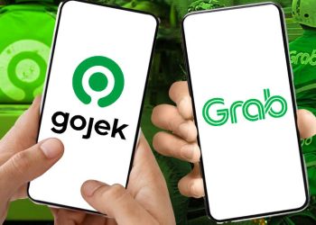 Masuknya Danantara ke saham aplikator ojol dinilai jadi sinyal kuat merger Gojek dan Grab. Analis soroti dampak ke pasar dan pengemudi. (Foto: Bloomberg Technoz)
