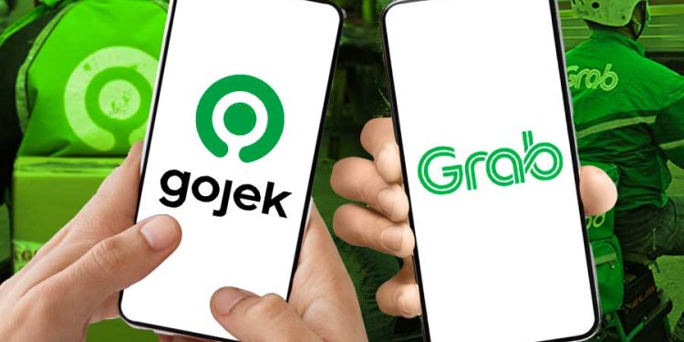 Masuknya Danantara ke saham aplikator ojol dinilai jadi sinyal kuat merger Gojek dan Grab. Analis soroti dampak ke pasar dan pengemudi. (Foto: Bloomberg Technoz)