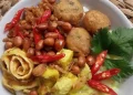Resep bubur suro khas Jawa yang gurih, lembut, dan mengenyangkan. Lengkap dengan kuah ayam santan serta tips membuat bubur suro anti gagal.