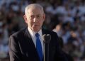 Benjamin Netanyahu disoraki saat menghadiri upacara kelulusan militer di Israel. Desakan agar mundur sebagai perdana menteri semakin menguat di tengah krisis politik.