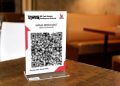 Malaysia mulai membangun sistem pembayaran QR terintegrasi yang memiliki konsep serupa QRIS. Indonesia lebih dulu menjadi pelopor sejak 2019.